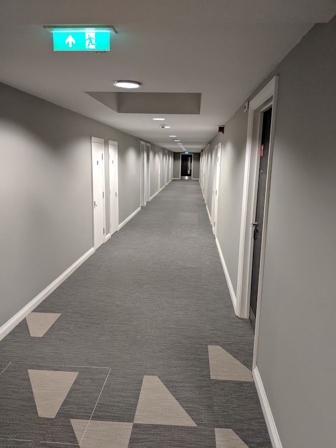 Clean and freshly painted commercial corridor