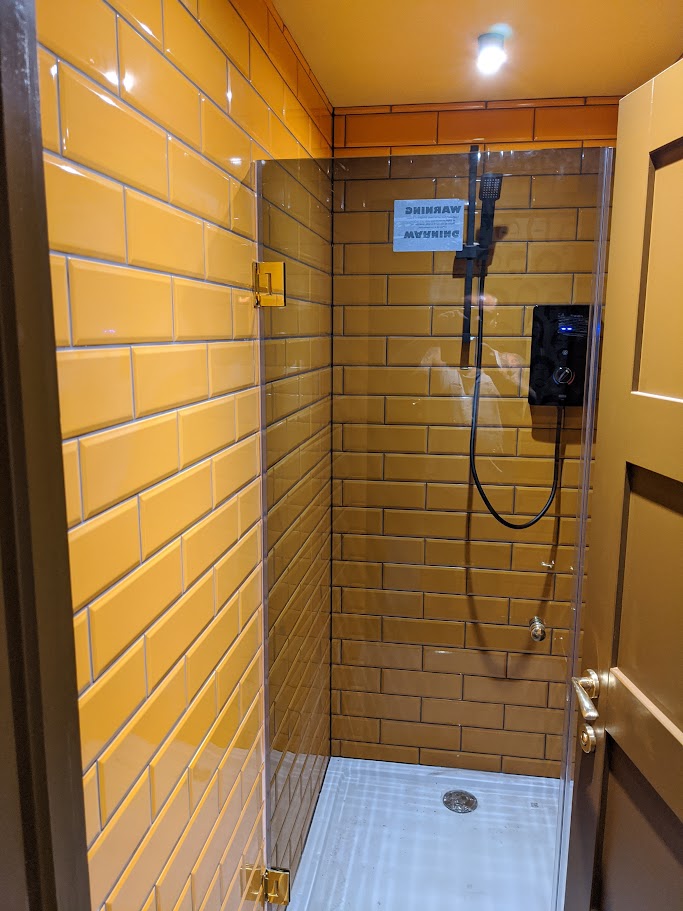 Wall tiling installation in a commercial washroom refurbishment