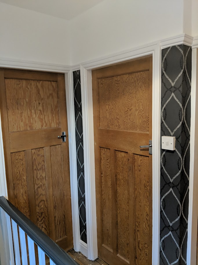 Maintaining and redecorating doors and woodwork in a commercial building