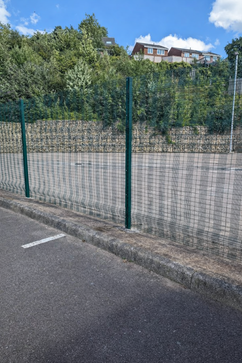 Welded mesh security fencing on a commercial perimeter