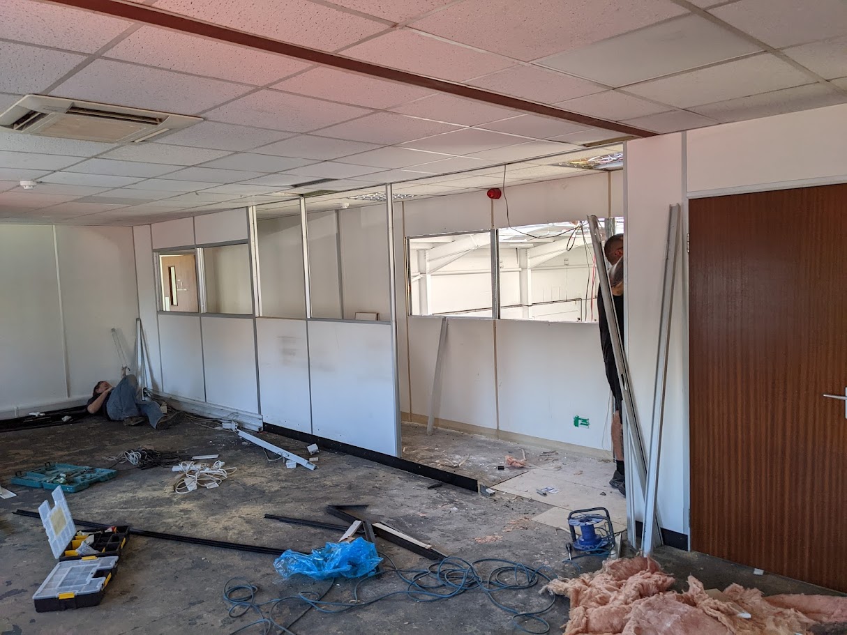 Removal of partition walls as part of a commercial office strip out project