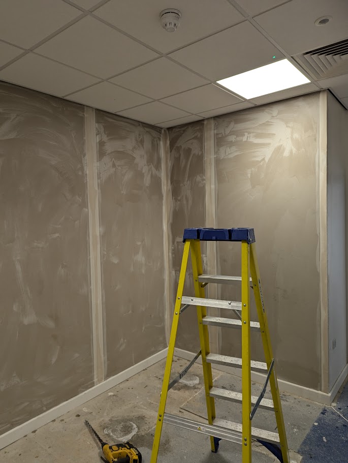 Completed suspended ceiling finish in a Sheffield office