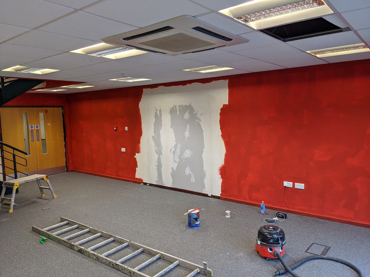 Patch plaster repair and making good around damaged wall areas