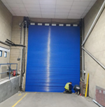 Industrial roller shutter door installation on warehouse