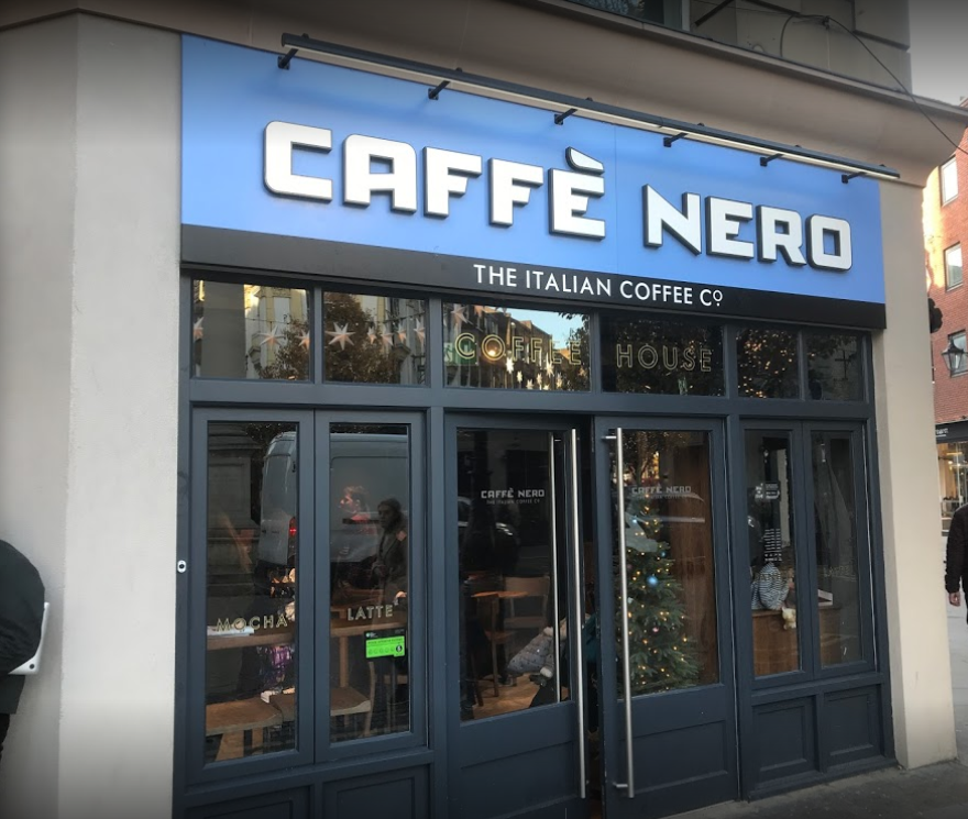 Finished shopfront glazing installation with clean edges and tidy sealant lines