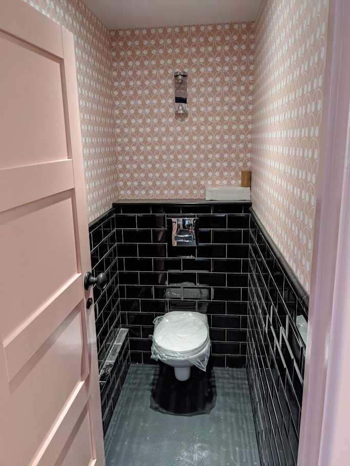 Installing WC cubicles as part of a commercial washroom refit